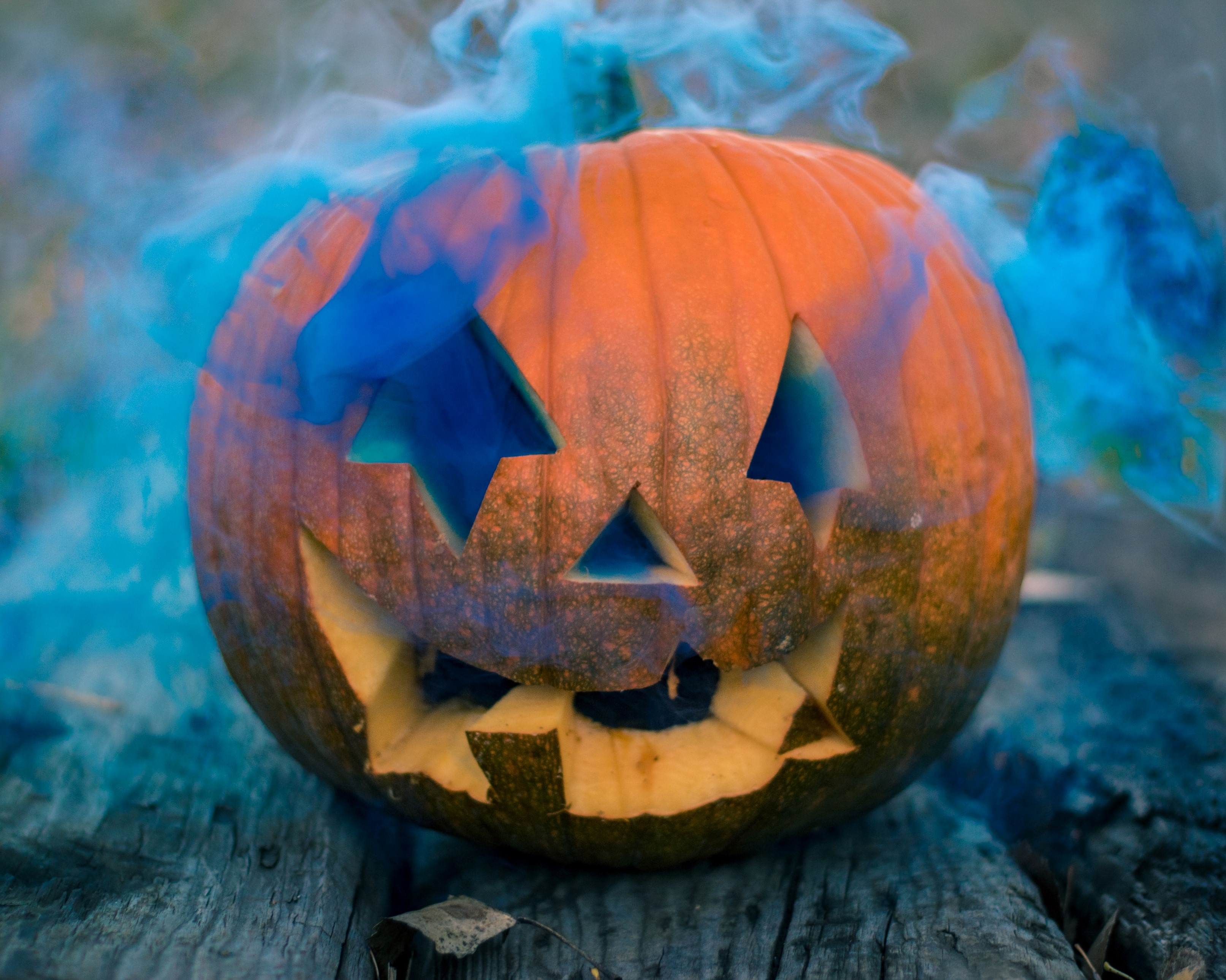 jack-o-lantern with blue smoke